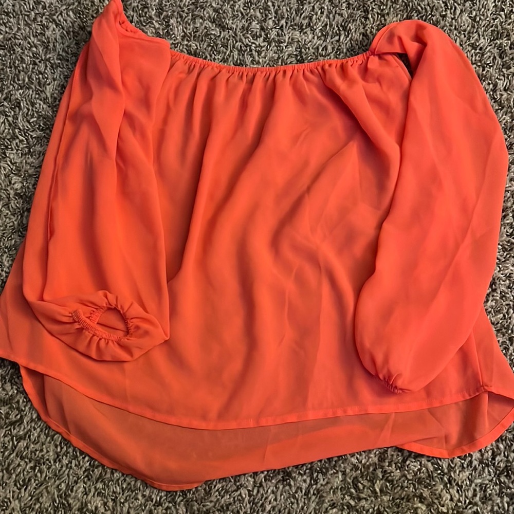 Off the shoulders coral pink flowy top.